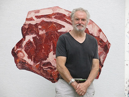 Ralph Fleck standing in front of "Steak 19/VI (Shorthorn Galloway)", oil on canvas 2020 in his studio, 2020   © Ilse Klär